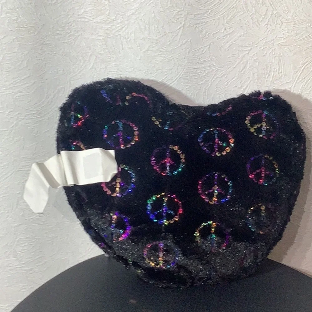 Plush heart shaped Pillow NWOT - with sequined peace signs - front and back